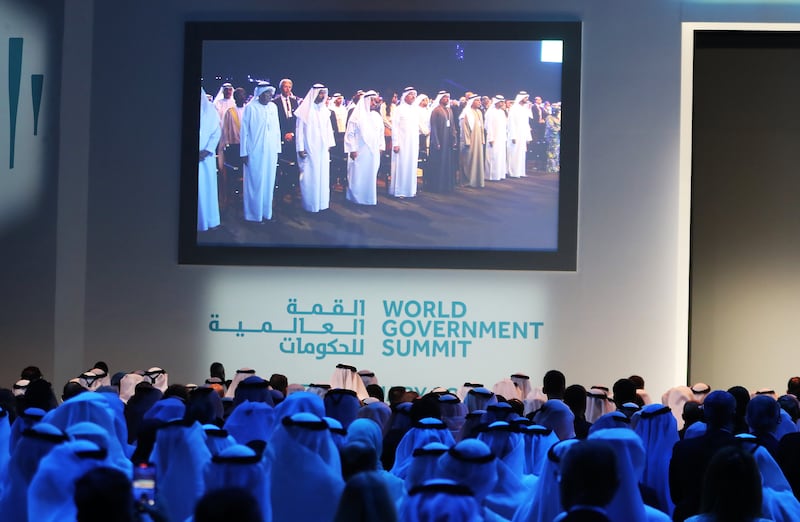 Delegates standing during the moment of silence for the Turkey – Syria earthquake before the start of World Government Summit in Dubai. Pawan Singh / The National