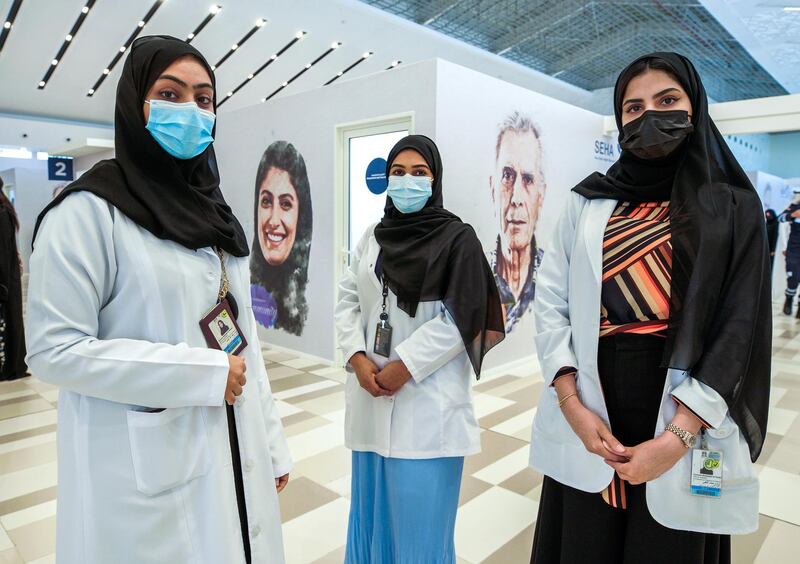 Abu Dhabi, United Arab Emirates, January 12, 2021. SEHA Vaccination Centre at the Abu Dhabi Cruise Terminal area.  Emirati healthcare workers, Mouza Al Beshr, Khadija Al Nuaimi and Za,zam Al Naqbi. 
Victor Besa/The National
Section:  NA
Reporter:  Shireena Al Nowais