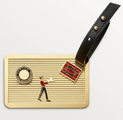 Cartier's Diabolo de Cartier travel tag is a luxurious upgrade from the usual identity tag. Photo: Cartier