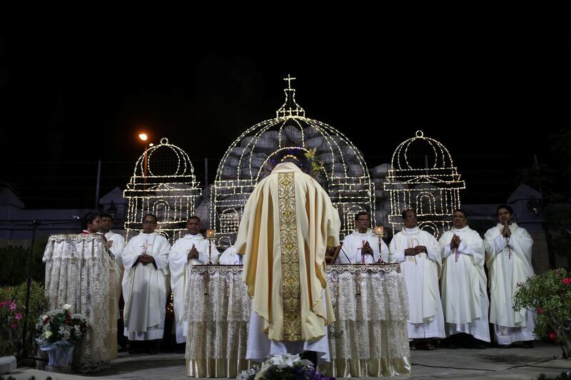 Members of the Christian expatriate community attend a mass on Christmas Eve at Santa Maria Church in Dubai, United Arab Emirates. Reuters