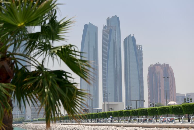 The Abu Dhabi skyline. The emirate is intensifying its promotion and marketing campaigns to attract 24 million visitors this year. Khushnum Bhandari / The National