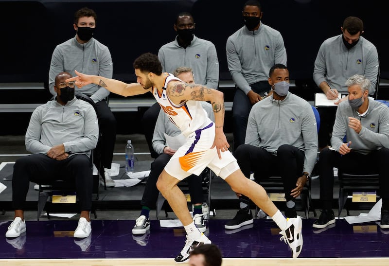 Abdel Nader celebrates a three-point shot against the Golden State Warriors. AFP