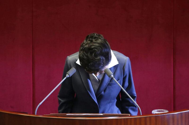 The South Korean president Park Geun-hye bows after delivering her speech on the 2015 budget bill during a plenary session at the National Assembly in Seoul on October 29, 2014. South Korea's economy was still in crisis despite some signs of improvement and it faces the risk of falling into a long-term slump, president Park Geun-hye said on Wednesday.  Kim Hong-Ji / Reuters
