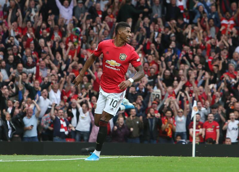 MANCHESTER, ENGLAND - AUGUST 11: Marcus Rashford of Manchester United celebrates scoring their third goal during the Premier League match between Manchester United and Chelsea FC at Old Trafford on August 11, 2019 in Manchester, United Kingdom. (Photo by Matthew Peters/Manchester United via Getty Images)