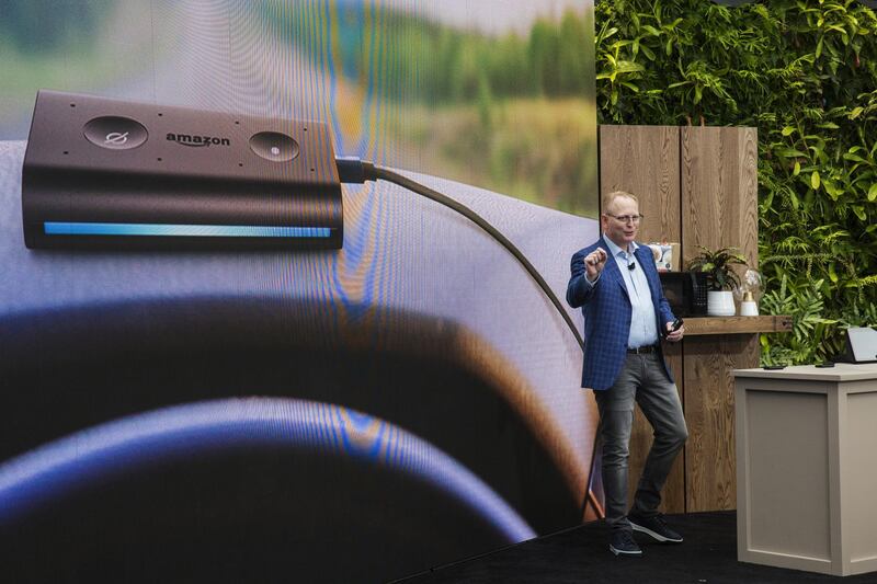 David Limp, senior vice president of devices and services at Amazon.com Inc., presents the Amazon Echo Auto smart device during an unveiling event at the company's Spheres headquarters in Seattle, Washington, U.S., on Thursday, Sept. 20, 2018. Amazon.com Inc. unveiled its vision for smart homes powered by the Alexa voice assistant, with a dizzying array of new gadgets and features for almost every room in the house -- from a microwave oven to a security camera and wall clock. Photographer: Andrew Burton/Bloomberg