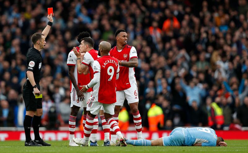 Arsenal's defender Gabriel receives a red card at the Emirates Stadium. AFP