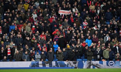 Soccer Football - Premier League - Brighton & Hove Albion vs Arsenal - The American Express Community Stadium, Brighton, Britain - March 4, 2018   Arsenal fans display banners in reference to manager Arsene Wenger   Action Images via Reuters/Tony O'Brien    EDITORIAL USE ONLY. No use with unauthorized audio, video, data, fixture lists, club/league logos or "live" services. Online in-match use limited to 75 images, no video emulation. No use in betting, games or single club/league/player publications.  Please contact your account representative for further details.