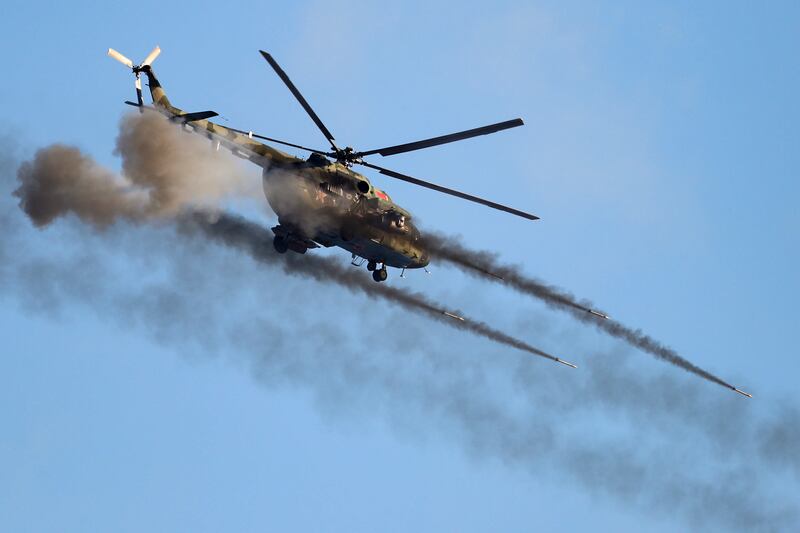A military helicopter fires missiles during the Russia-Belarus military drills in Belarus. AP