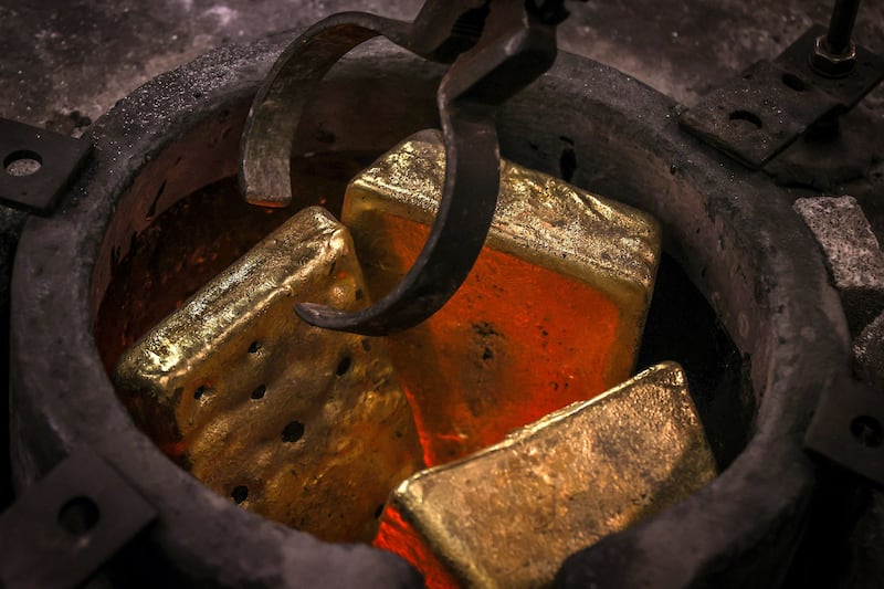 Melting gold bars. Egypt’s exports of gold in 2022 totalled about $1.5 million, government statistics show. AFP