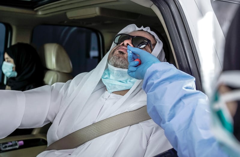 Dubai, United Arab Emirates, April 12, 2020.  A drive-through patient gets tested for the Coronavirus at the National Screening Center, Mina Rashed, Dubai.
Victor Besa / The National
Section:  NA
Reporter:  Nick Webster