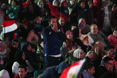 epa09733833 Egyptian soccer fans react after the live broadcast of the 2021 Africa Cup of Nations AFCON final soccer match between Senegal and Egypt in Cairo, Egypt, 06 February 2022. Egypt lost to Senegal 2-4 on penalties.  EPA/KHALED ELFIQI