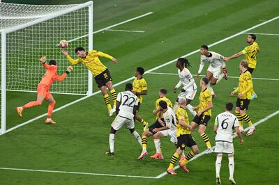 Real Madrid's defender Dani Carvajal (C) scores the opening goal during the match at Wembley Stadium. AFP