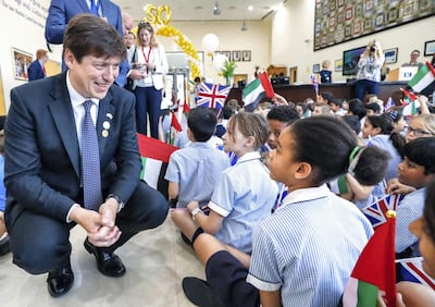 Abu Dhabi, U.A.E., September 24, 2018.  
Launch of 50 year celebrations of British School Al Khubairat. --British Ambassador, Patrick Moody, chats with a student during the anniversary celebrations.
Victor Besa / The National
Section:  NA
Reporter:  Haneen Dajani.