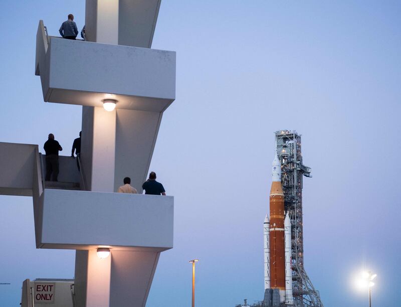 Nasa employees are seen on the stairs outside of the Rocco A. Petrone Launch Control Centre, Florida. AFP