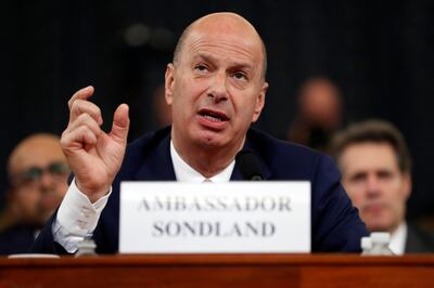 FILE - In this Wednesday, Nov. 20, 2019, file photo, U.S. Ambassador to the European Union Gordon Sondland testifies before the House Intelligence Committee on Capitol Hill in Washington, during a public impeachment hearing of President Donald Trump's efforts to tie U.S. aid for Ukraine to investigations of his political opponents. President Donald Trump has ousted Sondland, who gave damaging testimony in impeachment inquiry.  (AP Photo/Andrew Harnik, File)