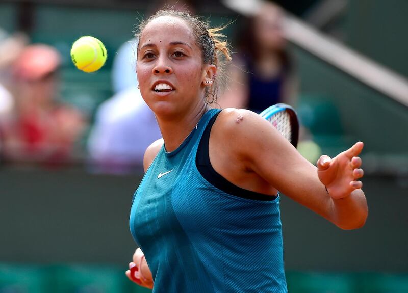 epa06782056 Madison Keys of the USA plays Mihaela Buzarnescu of Romania during their women’s round of 16 match during the French Open tennis tournament at Roland Garros in Paris, France, 03 June 2018.  EPA/CAROLINE BLUMBERG