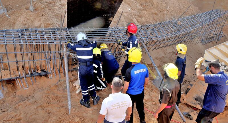 Police rescue two workers at a construction site in RAK after a mound of sand collapses on them. A third man was found dead. RAK Police