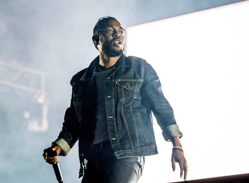 FILE - In this July 7, 2017, file photo, Kendrick Lamar performs during the Festival d'ete de Quebec in Quebec City, Canada. Lamar is nominated for seven Grammy nominations. The 60th Annual Grammy Awards will air on CBS, Sunday, Jan. 28, 2018, in New York. (Photo by Amy Harris/Invision/AP, File)