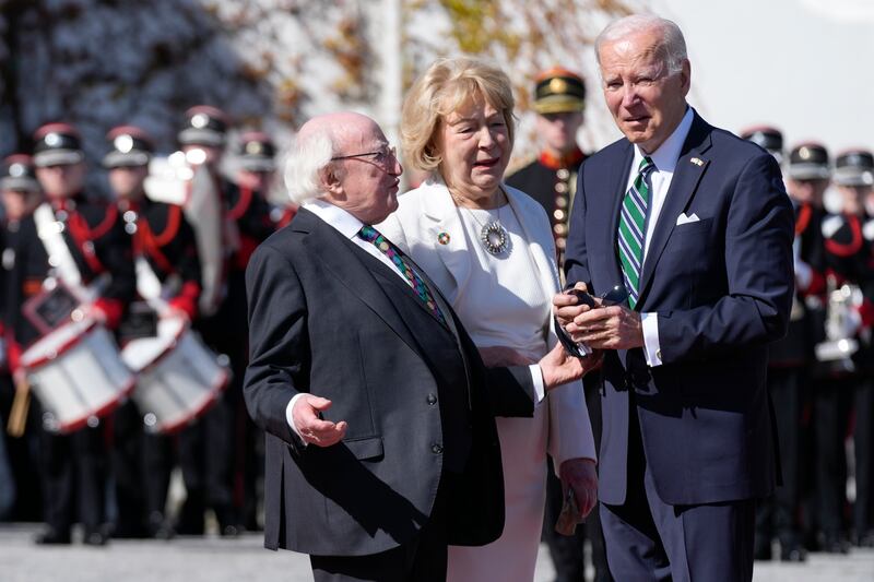 Mr Biden with Mr Higgins and his wife Sabina at Aras an Uachtarain. AP