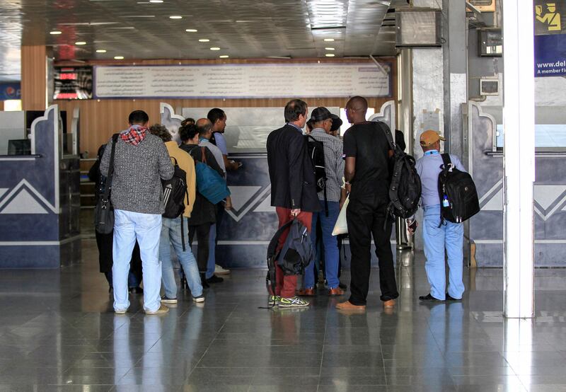 Travellers wait at passport control in 2015. With the resumption of passenger flights, this should be a sight at the airport once again. AFP