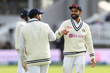 LONDON, ENGLAND - AUGUST 16: Virat Kohli smiles at Rishabh Pant of India during the fifth day of the 2nd LV= Test Match between England and India at Lord's Cricket Ground on August 16, 2021 in London, England. (Photo by Philip Brown / Popperfoto / Popperfoto via Getty Images)