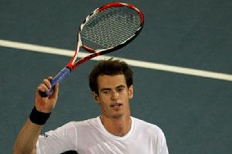 Britain's Andy Murray salutes the crowd after beating Spanish top-seeded player Rafael Nadal in the final of the Capitala World Tennis Championship.