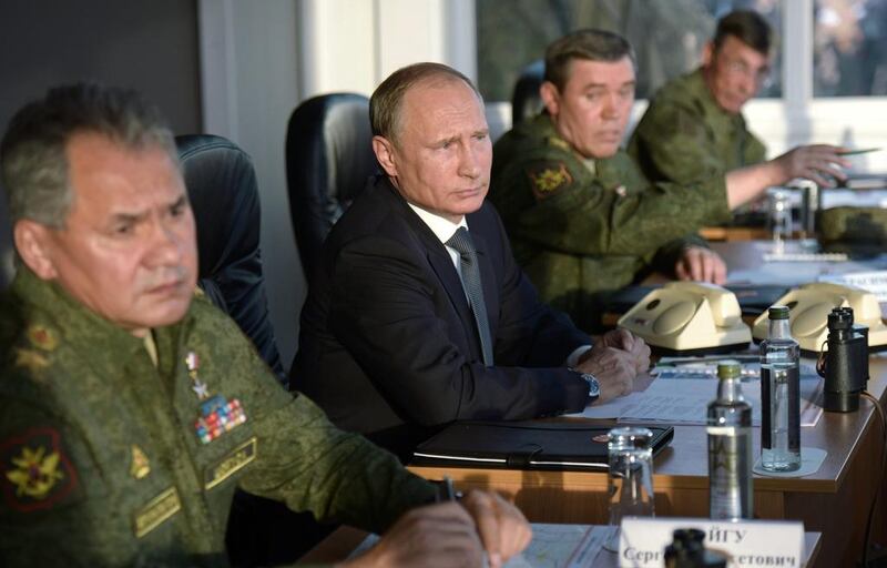 Russian president Vladimir Putin, second left, will meet with his American counterpart Barack Obama when he travels to the United States to speak at the UN general assembly next week. Alexei Nikolsky/RIA-Novosti, Kremlin Pool Photo via AP