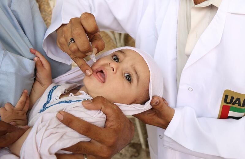 Millions of children have received vaccines, including against polio, pictured, in the schemes run by the UAE. Credit / WAM