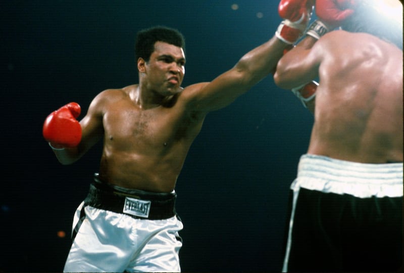 LANDOVER, MD - MAY 16: Mohammad Ali, left, throws a punch at Alfredo Evangelista, right, during an WBC/WBA heavyweight championship fight on May 16, 1977 at the Capital Center  in Landover, Maryland. Ali won the fight with a unanimous decision. (Photo by Focus on Sport/Getty Images) 