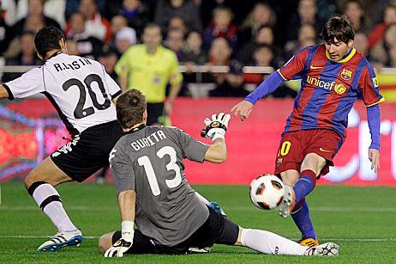 Lionel Messi, right, missed a host of chances before scoring Barca's winner in the 77th minute.