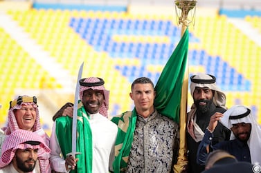 Al-Nassr's Cristiano Ronaldo celebrates Saudi Arabia's Founding Day wearing local traditional clothes at Al-Nassr Football Club in Riyadh, Saudi Arabia, February 22, 2023. Al-Nassr FC/Handout via REUTERS ATTENTION EDITORS - THIS PICTURE WAS PROVIDED BY A THIRD PARTY
