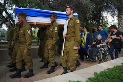Israeli soldiers carry the coffin of one of those killed. AP Photo 