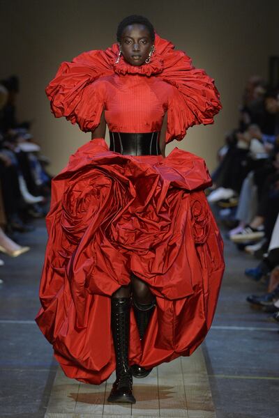 The show features dresses crafted from fabric that melded into voluminous floral forms. Courtesy Alexander McQueen