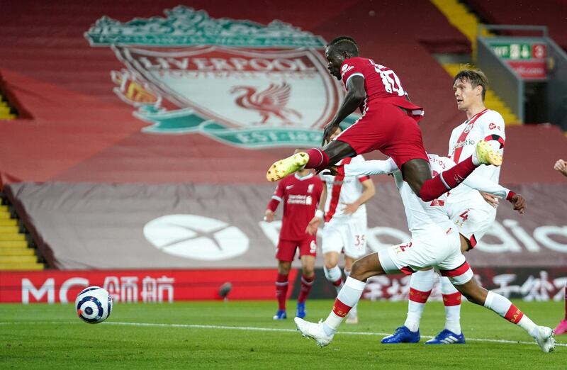 Liverpool's Sadio Mane scores his side's first goal. PA