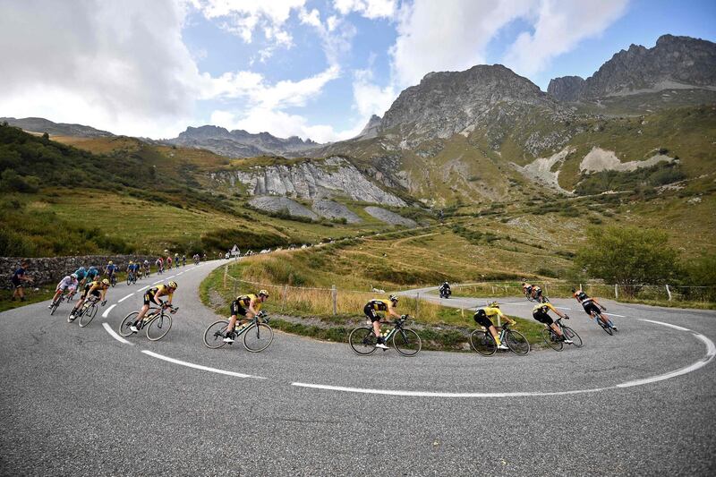 The pack rides during the 17th stage of the 107th edition of the Tour de France cycling race, 170km between Grenoble and Meribel.  AFP