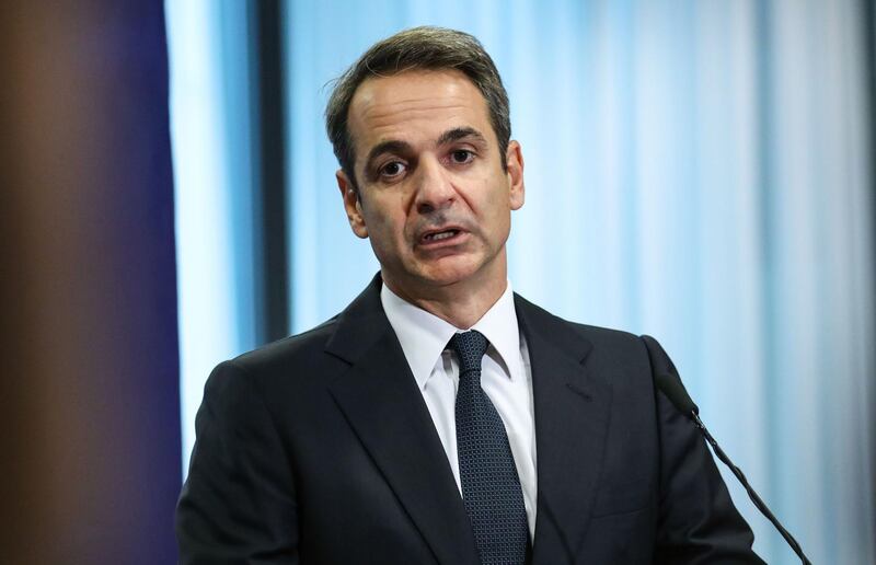 Greek Prime Minister Kyriakos Mitsotakis addresses media representatives at a press conference following a European Union Summit at European Union Headquarters in Brussels on October 18, 2019.  / AFP / Aris OIKONOMOU
