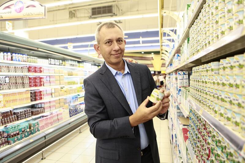 Maurits Klavert, managing director of FreislandCampina Middle East, pictured with Rainbow Milk, one of his company’s products for sale at Lulu Hypermarket in Dubai. Sarah Dea / The National