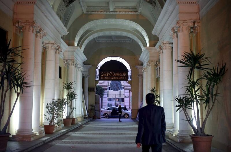 A man walks past classical Greek style columns as he leaves Alexandria Opera House and walks towards Fouad street on March 6, 2016. Asmaa Waguih/Reuters