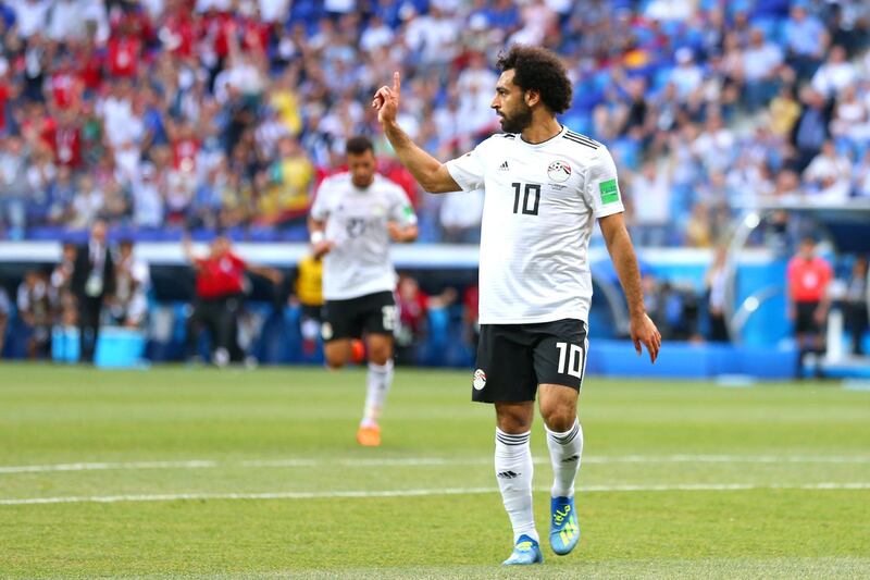 VOLGOGRAD, RUSSIA - JUNE 25:   Mohamed Salah of Egypt celebrates scoring a goal to make it 0-1 during the 2018 FIFA World Cup Russia group A match between Saudi Arabia and Egypt at Volgograd Arena on June 25, 2018 in Volgograd, Russia. (Photo by Robbie Jay Barratt - AMA/Getty Images)