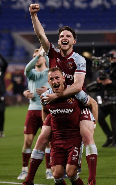 West Ham's Declan Rice (top) and Vladimir Coufal celebrate the win. EPA