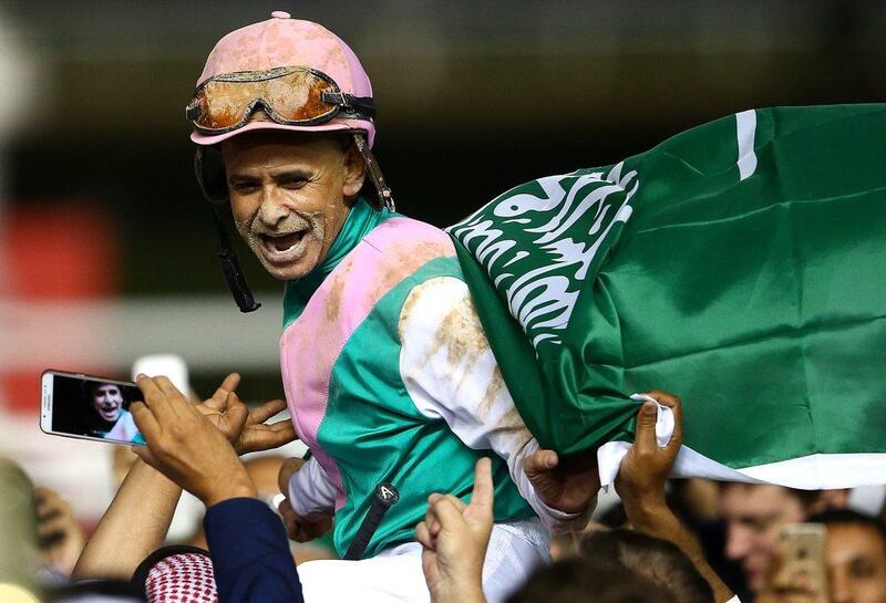 Mike Smith riding Arrogate celebrates winning the Dubai World Cup. Francois Nel / Getty Images