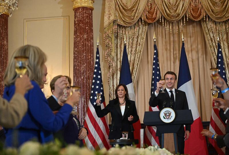 Mr Macron kept guests waiting when his meeting with President Joe Biden ran long. He apologised and joked: 'We fixed everything.' AFP