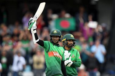 Shakib Al Hasan celebrates his century for Bangladesh against the West Indies. Getty Images