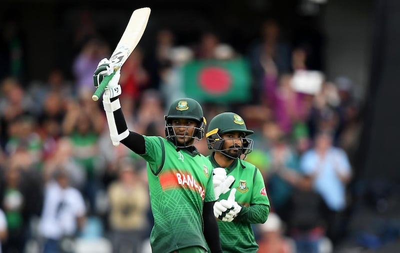 TAUNTON, ENGLAND - JUNE 17: Shakib Al Hasan of Bangladesh celebrates his century with Liton Das of Bangladesh during the Group Stage match of the ICC Cricket World Cup 2019 between West Indies and Bangladesh at The County Ground on June 17, 2019 in Taunton, England. (Photo by Alex Davidson/Getty Images)