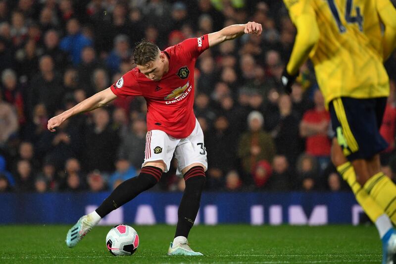 Manchester United midfielder Scott McTominay strikes the ball to open the scoring on the stroke of half time. AFP