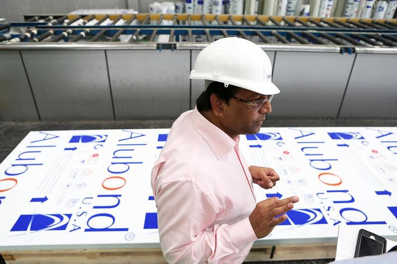 Shaji Ul Mulk, the chairman of the company that makes Alubond panels, says they do not make non-combustible panels in the UAE because of a lack of local demand. Pawan Singh / The National