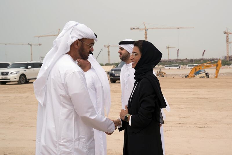 YAS ISLAND, ABU DHABI, UNITED ARAB EMIRATES - March 01, 2018: HH Sheikh Mohamed bin Zayed Al Nahyan, Crown Prince of Abu Dhabi and Deputy Supreme Commander of the UAE Armed Forces (L), greets HE Noura Mohamed Al Kaabi, UAE Minister of Culture and Knowledge Development (R), during the inspection of the urban development and tourism projects, at Yas Bay. Seen with HH Sheikh Theyab bin Mohamed bin Zayed Al Nahyan, Chairman of the Department of Transport, and Abu Dhabi Executive Council Member (2nd R).

( Mohamed Al Hammadi / Crown Prince Court - Abu Dhabi )
---