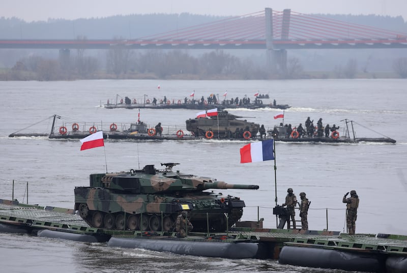 A Polish Leopard 2PL main battle tank on a French military ferry while crossing the Vistula River. Getty Images
