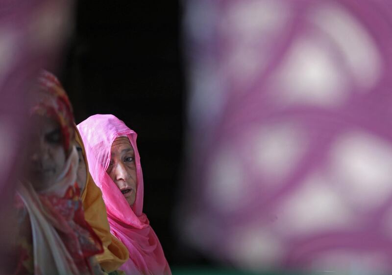 A Kashmiri women prays inside the shrine of Mir Syed Ali Hamdani during Ramadan in Srinagar.  Reuters