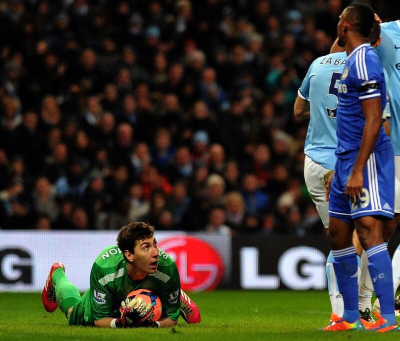 Manchester City's Romanian goalkeeper Costel Pantilimon gathers the ball after a shot on Saturday. Paul Ellis / AFP